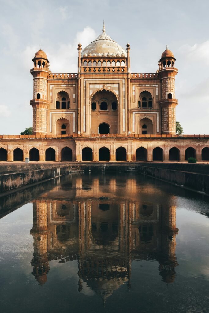 Stunning reflection of Safdarjung Tomb in New Delhi, India, showcasing its historic Mughal architecture.